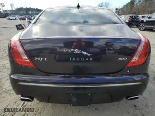 2013 Jaguar XJ with VIN SAJWA2G12DLV57581, listed as a Copart auction lot 84736054 with 91,779 mi miles and Salvage Title. Bid and sale history available at carsss.com. Image 6.