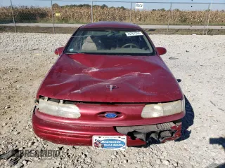 1995 Ford Taurus GL with VIN 1FALP52U4SG166768, listed as a Copart auction lot 76761214 with 58,218 mi miles and Clean Title. Bid and sale history available at carsss.com. Image 5.