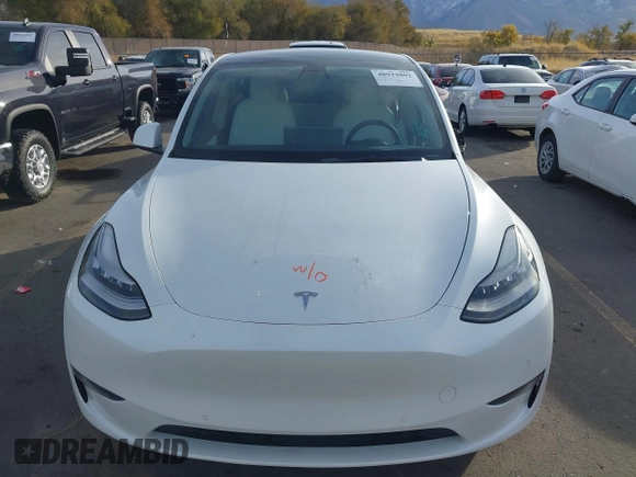 2021 Tesla Model Y Long Range with VIN 5YJYGDEE3MF098586, listed as a IAAI auction lot 40939802 with Not Provided miles and . Bid and sale history available at DreamBid. Image 11.
