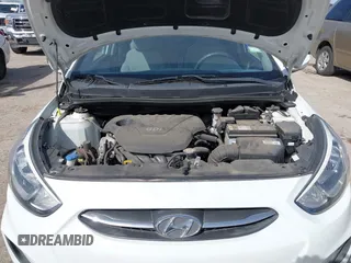 2015 Hyundai Accent GLS with VIN KMHCT4AE3FU892067, listed as a IAAI auction lot 41752679 with 72,415 mi miles and . Bid and sale history available at DreamBid. Image 10.