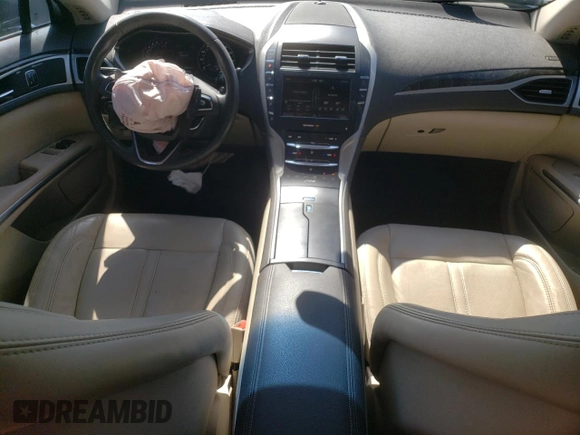 2016 Lincoln MKZ с VIN 3LN6L2G98GR615967, выставлен на аукционе Copart как лот 73792814 с пробегом 86 598 миль миль и Списание • Salvage title. История ставок и продаж доступна на DreamBid. Изображение 8.