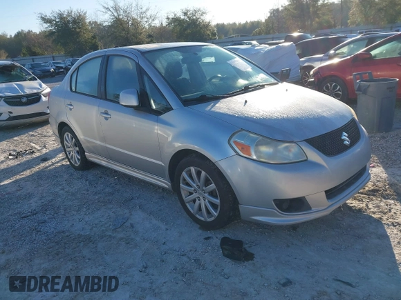 2010 Suzuki SX4 with VIN JS2YC5A46A6310134, listed as a IAAI auction lot 41696108 with 147,059 mi miles and . Bid and sale history available at DreamBid. Image 1.