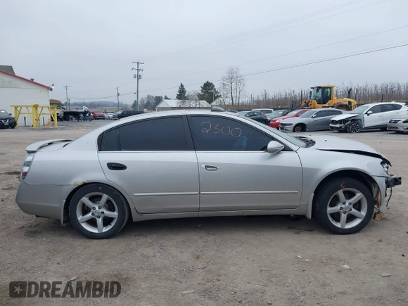 2005 Nissan Altima SE with VIN 1N4BL11E65C133566, listed as a IAAI auction lot 41792300 with 169,733 mi miles. Bid and sale history available at carsss.com. Image 13.