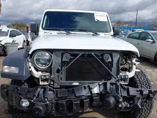 2020 Jeep Wrangler Unlimited Sport Altitude with VIN 1C4HJXDG9LW315977, listed as a IAAI auction lot 41788892 with 60,380 mi miles. Bid and sale history available at carsss.com. Image 13.