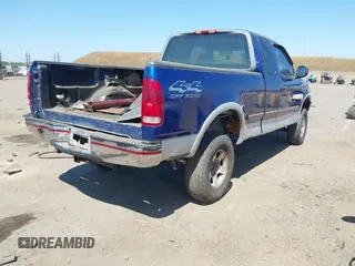 1997 Ford F-150 XL with VIN 1FTDX18W4VKC95711, listed as a IAAI auction lot 42197302 with 287,660 mi miles and . Bid and sale history available at DreamBid. Image 4.