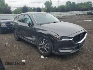 2018 Mazda CX-5 Grand Touring с VIN JM3KFBDM8J0424633, выставлен на аукционе Copart как лот 59888035 с пробегом 77 721 миль миль и Списание • Salvage title. История ставок и продаж доступна на DreamBid. Изображение 4.