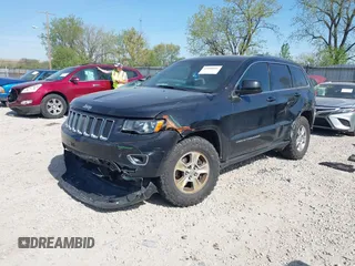 2014 Jeep Grand Cherokee Laredo with VIN 1C4RJEAG0EC442053, listed as a IAAI auction lot 42098601 with 200,982 mi miles and . Bid and sale history available at DreamBid. Image 2.