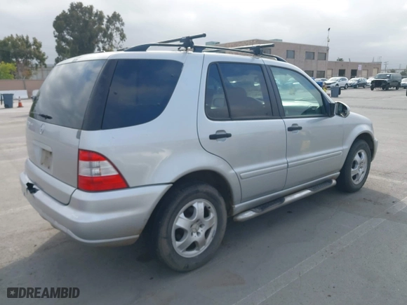 2003 Mercedes-Benz M-Class 3.7L with VIN 4JGAB57EX3A435535, listed as a IAAI auction lot 42099551 with 205,226 mi miles. Bid and sale history available at carsss.com. Image 4.