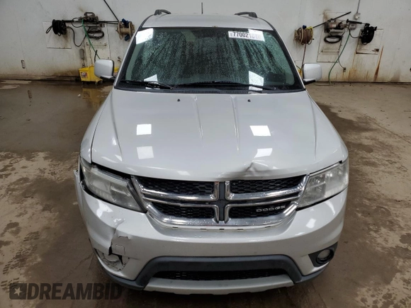 2012 Dodge Journey SXT с VIN 3C4PDCCG4CT133946, выставлен на аукционе Copart как лот 77002184 с пробегом 118 985 миль миль и Чистый • Clean title. История ставок и продаж доступна на DreamBid. Изображение 5.