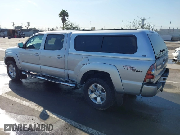2013 Toyota Tacoma PreRunner with VIN 3TMKU4HN8DM034338, listed as a IAAI auction lot 41808842 with 142,012 mi miles and . Bid and sale history available at DreamBid. Image 3.