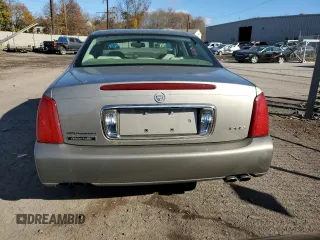 2002 Cadillac DeVille DHS z VIN 1G6KE54Y62U248629, wystawiony jako Copart lot #79825284 z przebiegiem 99 568 mil mil oraz Szkoda całkowita • Salvage title. Historia ofert i sprzedaży dostępna na DreamBid. Obrazek 6.