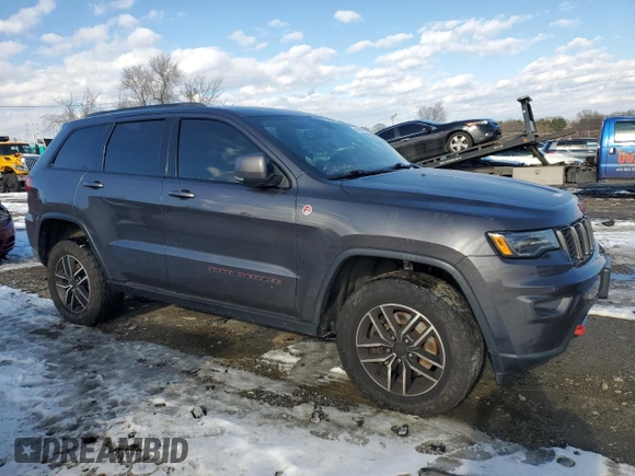 2021 Jeep Grand Cherokee Trailhawk with VIN 1C4RJFLT4MC567460, listed as a Copart auction lot 41455725 with 60,848 mi miles and Salvage Title. Bid and sale history available at carsss.com. Image 4.