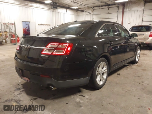 2015 Ford Taurus SE with VIN 1FAHP2D81FG159514, listed as a IAAI auction lot 41641336 with 110,137 mi miles and . Bid and sale history available at carsss.com. Image 4.