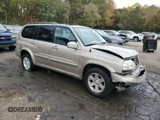 2002 Suzuki XL7 Standard z VIN JS3TY92V524101048, wystawiony jako Copart lot #77658264 z przebiegiem 226 279 mil mil oraz Szkoda całkowita • Salvage title. Historia ofert i sprzedaży dostępna na DreamBid. Obrazek 4.