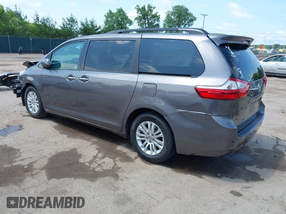 2015 Toyota Sienna XLE with VIN 5TDYK3DCXFS633128, listed as a IAAI auction lot 42527073 with 149,926 mi miles and . Bid and sale history available at DreamBid. Image 3.