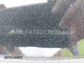 2013 Mazda 3 i Touring with VIN JM1BL1V7XD1762666, listed as a IAAI auction lot 41915630 with 152,218 mi miles and . Bid and sale history available at DreamBid. Image 18.
