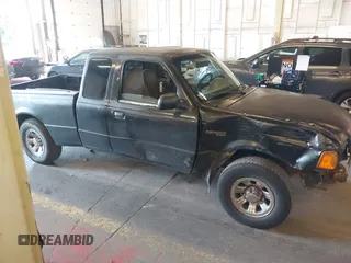 2001 Ford Ranger XLT Appearance with VIN 1FTYR14E51PA38398, listed as a IAAI auction lot 40142183 with 220,681 mi miles. Bid and sale history available at carsss.com. Image 13.