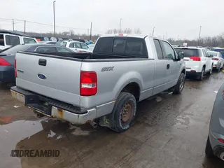2005 Ford F-150 STX with VIN 1FTRX12W55FB28555, listed as a IAAI auction lot 41985722 with 87,833 mi miles. Bid and sale history available at carsss.com. Image 4.