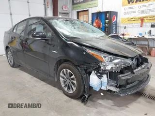 2022 Toyota Prius L Eco z VIN JTDKAMFU2N3186072, wystawiony jako IAAI lot #42486252 z przebiegiem 5 887 mil mil oraz . Historia ofert i sprzedaży dostępna na DreamBid. Obrazek 1.