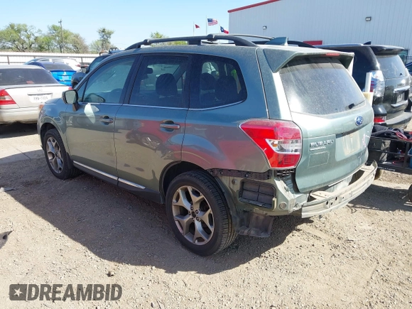 2016 Subaru Forester 2.5i Touring with VIN JF2SJAVC0GH460559, listed as a IAAI auction lot 41829487 with 115,855 mi miles. Bid and sale history available at carsss.com. Image 3.
