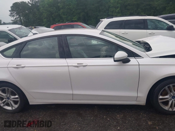 2018 Ford Fusion SE z VIN 3FA6P0H75JR159448, wystawiony jako IAAI lot #42262839 z przebiegiem 144 353 mil mil oraz . Historia ofert i sprzedaży dostępna na DreamBid. Obrazek 13.