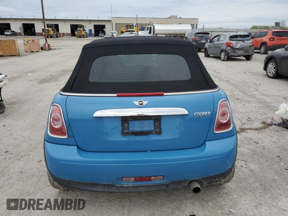 2014 MINI Convertible z VIN WMWZN3C57ET570016, wystawiony jako Copart lot #54565815 z przebiegiem 74 742 mil mil oraz Szkoda całkowita • Salvage title. Historia ofert i sprzedaży dostępna na DreamBid. Obrazek 6.