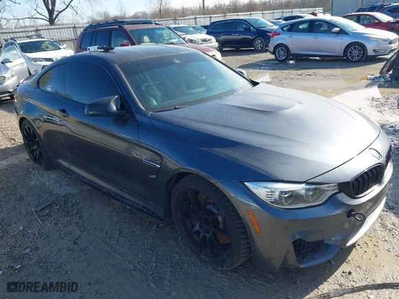 2015 BMW M4 with VIN WBS3R9C57FK334921, listed as a IAAI auction lot 41869773 with 107,058 mi miles. Bid and sale history available at carsss.com. Image 1.