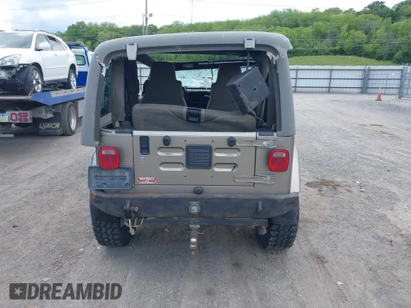 2004 Jeep Wrangler Sahara with VIN 1J4FA59S54P740417, listed as a IAAI auction lot 42382078 with 200,108 mi miles and . Bid and sale history available at DreamBid. Image 17.