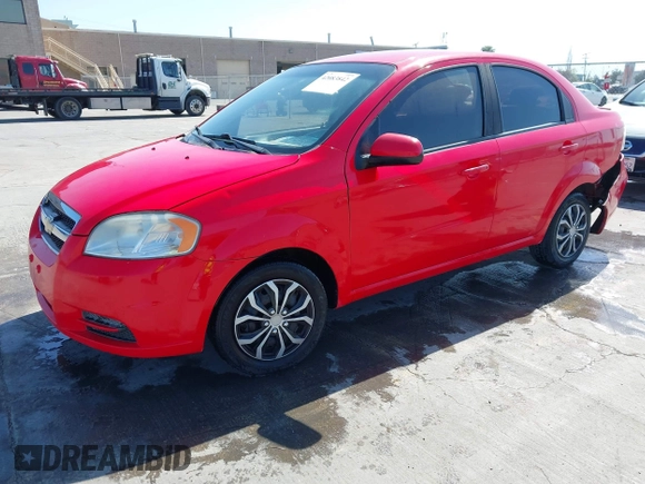 2011 Chevrolet Aveo 1LT z VIN KL1TD5DE0BB151956, wystawiony jako IAAI lot #42083842 z przebiegiem 115 607 mil mil oraz . Historia ofert i sprzedaży dostępna na DreamBid. Obrazek 17.