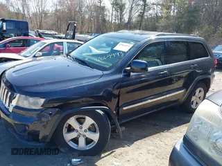 2013 Jeep Grand Cherokee Laredo with VIN 1C4RJFAG1DC592371, listed as a IAAI auction lot 42064993 with 136,154 mi miles. Bid and sale history available at carsss.com. Image 14.