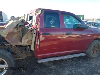 2014 Ram 1500 Tradesman z VIN 1C6RR7FT4ES171215, wystawiony jako IAAI lot #41293240 z przebiegiem 115 967 mil mil oraz . Historia ofert i sprzedaży dostępna na DreamBid. Obrazek 14.
