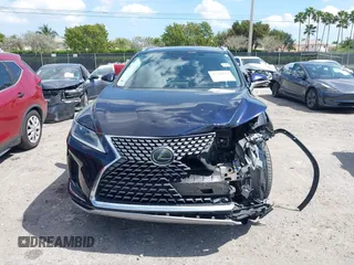 2020 Lexus RX with VIN 2T2AZMAA8LC177233, listed as a IAAI auction lot 41708568 with 62,778 mi miles. Bid and sale history available at carsss.com. Image 12.