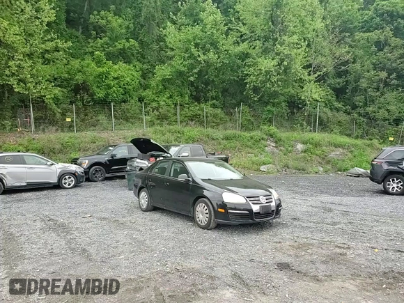 2009 Volkswagen Jetta S z VIN 3VWJZ71K09M010117, wystawiony jako Copart lot #56309165 z przebiegiem 181 692 mil mil oraz Szkoda całkowita • Salvage title. Historia ofert i sprzedaży dostępna na DreamBid. Obrazek 13.
