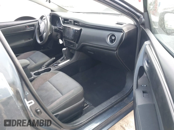 2017 Toyota Corolla L with VIN 2T1BURHEXHC814658, listed as a IAAI auction lot 41696935 with 94,598 mi miles and . Bid and sale history available at DreamBid. Image 5.