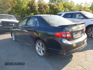 2009 Toyota Corolla XRS with VIN 1NXBE40E59Z003796, listed as a IAAI auction lot 42077772 with 215,159 mi miles. Bid and sale history available at carsss.com. Image 3.