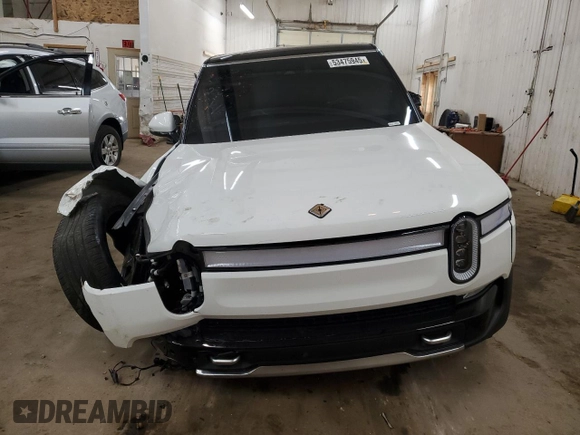 2023 Rivian R1S Adventure z VIN 7PDSGABA2PN013659, wystawiony jako Copart lot #53475945 z przebiegiem 13 928 mil mil oraz Szkody całkowita. Historia ofert i sprzedaży dostępna na DreamBid. Obrazek 5.