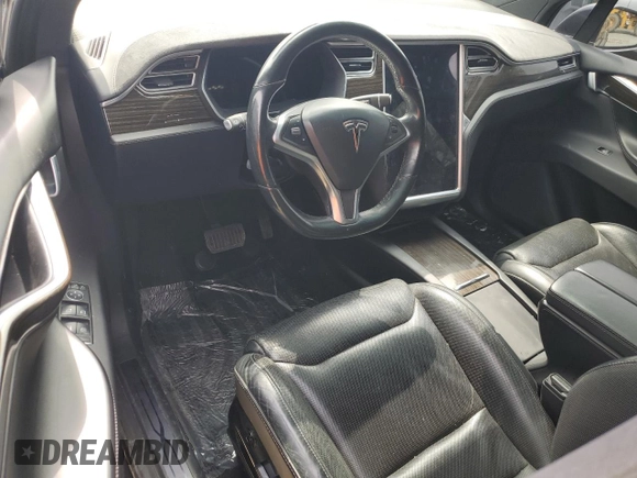 2016 Tesla Model X 70D z VIN 5YJXCBE23GF005295, wystawiony jako Copart lot #51034005 z przebiegiem 130 325 mil mil oraz Szkody całkowita. Historia ofert i sprzedaży dostępna na DreamBid. Obrazek 8.