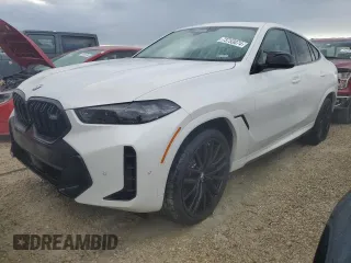 2025 BMW X6 M60i with VIN 5UX43EX07S9X98716, listed as a Copart auction lot 73753074 with 63 mi miles and Salvage Title. Bid and sale history available at carsss.com. Image 1.