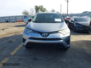 2016 Toyota RAV4 LE with VIN 2T3ZFREV0GW235051, listed as a IAAI auction lot 41750295 with 157,132 mi miles. Bid and sale history available at carsss.com. Image 12.