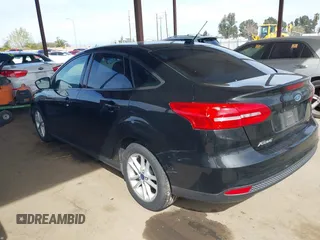 2015 Ford Focus SE with VIN 1FADP3F25FL330463, listed as a IAAI auction lot 41755867 with 72,725 mi miles. Bid and sale history available at carsss.com. Image 3.