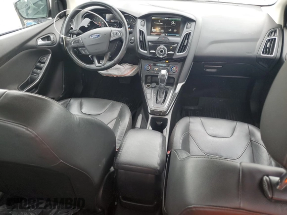 2015 Ford Focus Titanium с VIN 1FADP3J21FL254702, выставлен на аукционе Copart как лот 59872395 с пробегом 93 195 миль миль и Списание • Salvage title. История ставок и продаж доступна на DreamBid. Изображение 8.