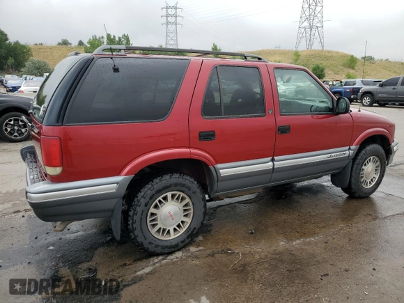 1997 GMC Jimmy SLS with VIN 1GKDT13W8V2515536, listed as a Copart auction lot 66701094 with 123,051 mi miles and Salvage Title. Bid and sale history available at carsss.com. Image 3.