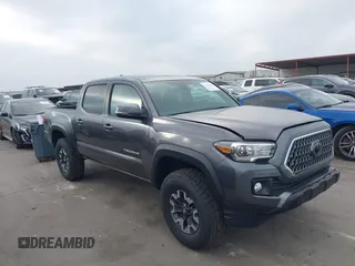 2018 Toyota Tacoma SR with VIN 5TFCZ5AN6JX127774, listed as a IAAI auction lot 41801158 with 28,161 mi miles and . Bid and sale history available at DreamBid. Image 1.
