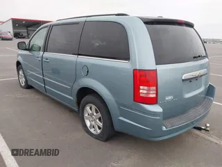 2010 Chrysler Town & Country Touring with VIN 2A4RR5D18AR343699, listed as a IAAI auction lot 42035736 with 222,807 mi miles and . Bid and sale history available at DreamBid. Image 3.