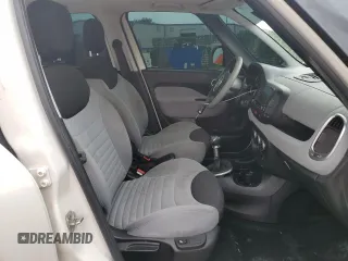 2014 FIAT 500L Easy with VIN ZFBCFABH0EZ000672, listed as a Copart auction lot 62691854 with 60,941 mi miles and Salvage Title. Bid and sale history available at DreamBid. Image 7.