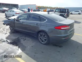 2019 Ford Fusion SEL with VIN 3FA6P0CD9KR252892, listed as a IAAI auction lot 41087776 with 109,498 mi miles and . Bid and sale history available at DreamBid. Image 3.