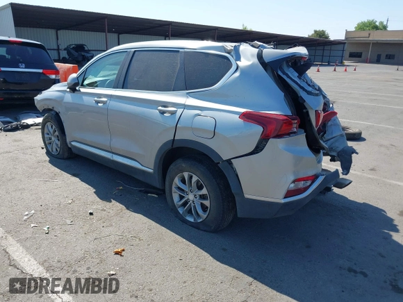 2020 Hyundai Santa Fe SE z VIN 5NMS2CAD1LH221326, wystawiony jako IAAI lot #42442177 z przebiegiem 68 995 mil mil oraz . Historia ofert i sprzedaży dostępna na DreamBid. Obrazek 3.