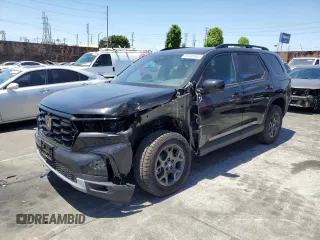 2025 Honda Pilot TrailSport z VIN 5FNYG1H62SB101798, wystawiony jako Copart lot #55340585 z przebiegiem 1 065 mil mil oraz Szkoda całkowita • Salvage title. Historia ofert i sprzedaży dostępna na DreamBid. Obrazek 1.