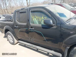 2011 Nissan Frontier PRO-4X with VIN 1N6AD0EV3BC409198, listed as a IAAI auction lot 41793467 with 177,192 mi miles. Bid and sale history available at carsss.com. Image 6.