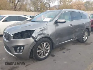 2017 Kia Sorento SX with VIN 5XYPKDA59HG304752, listed as a IAAI auction lot 40931971 with 143,211 mi miles and . Bid and sale history available at DreamBid. Image 2.